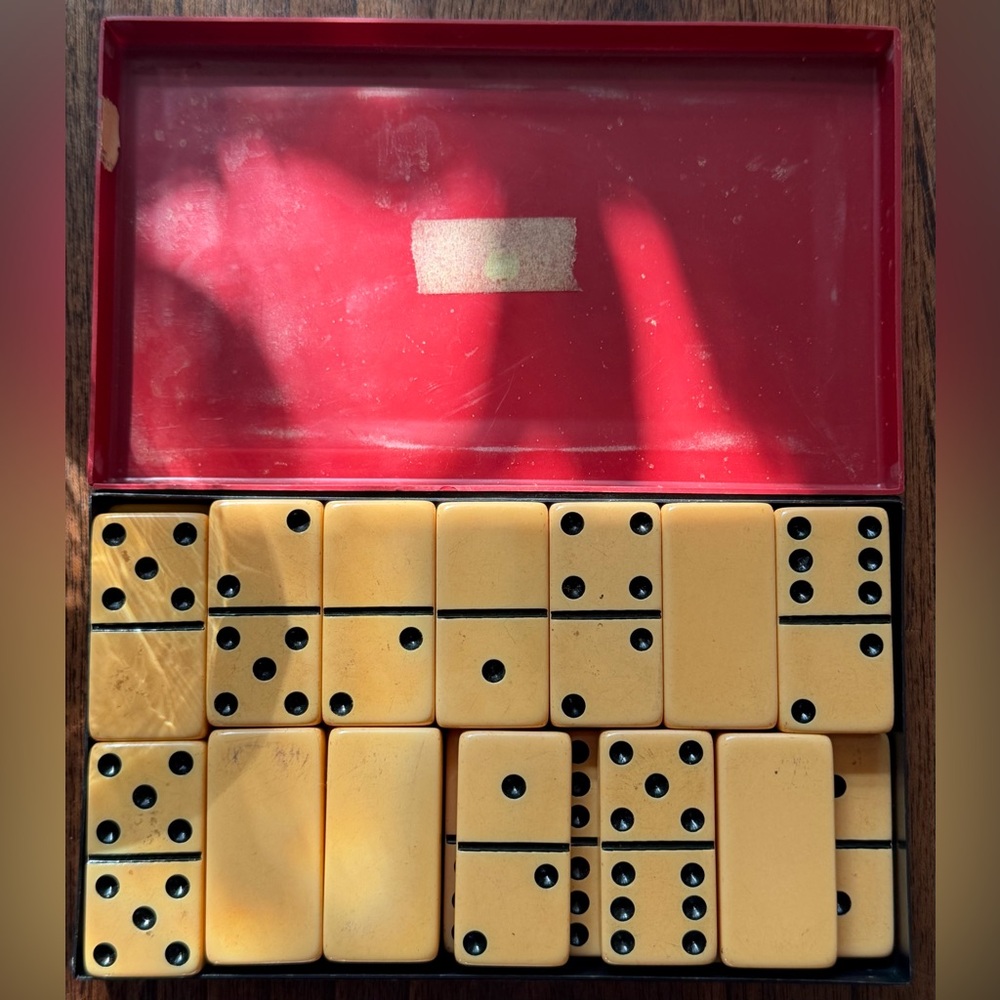 Vintage Crisloid 28-piece butterscotch Domino set in Red case
